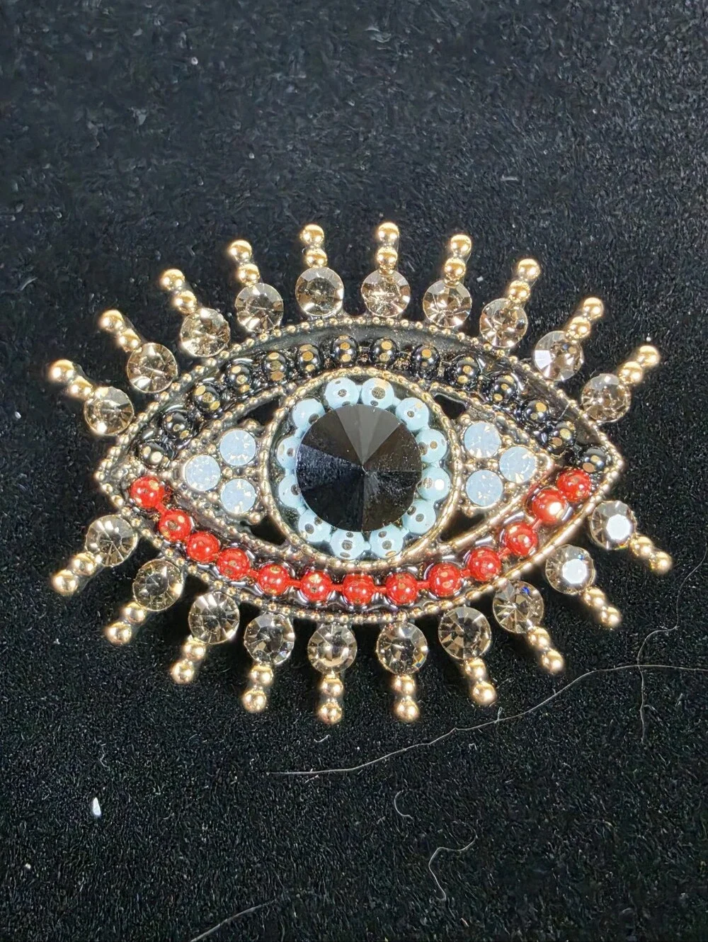 Gold Tone Eye Brooch Pin with Black Center and Red Accents